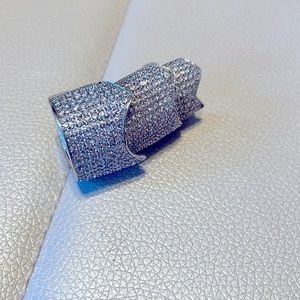Pavé-Set Crystal Hinged
Plate Ring
$300